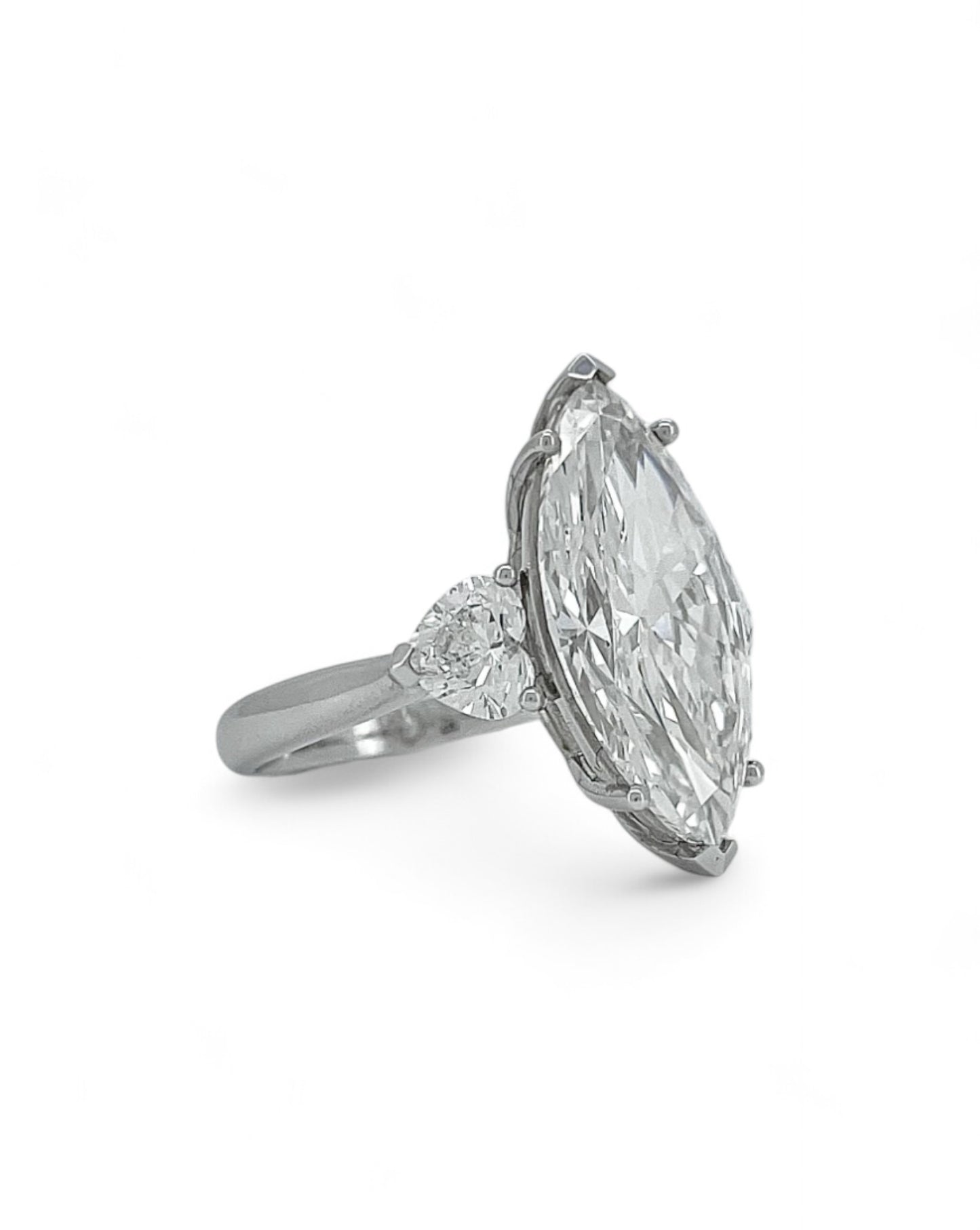 Elegance Marquise Diamond Ring with Heart Side Stones