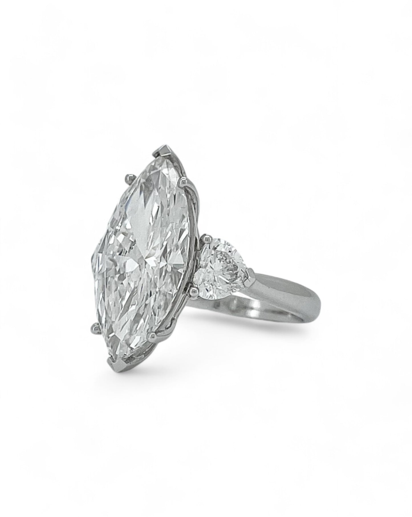 Elegance Marquise Diamond Ring with Heart Side Stones